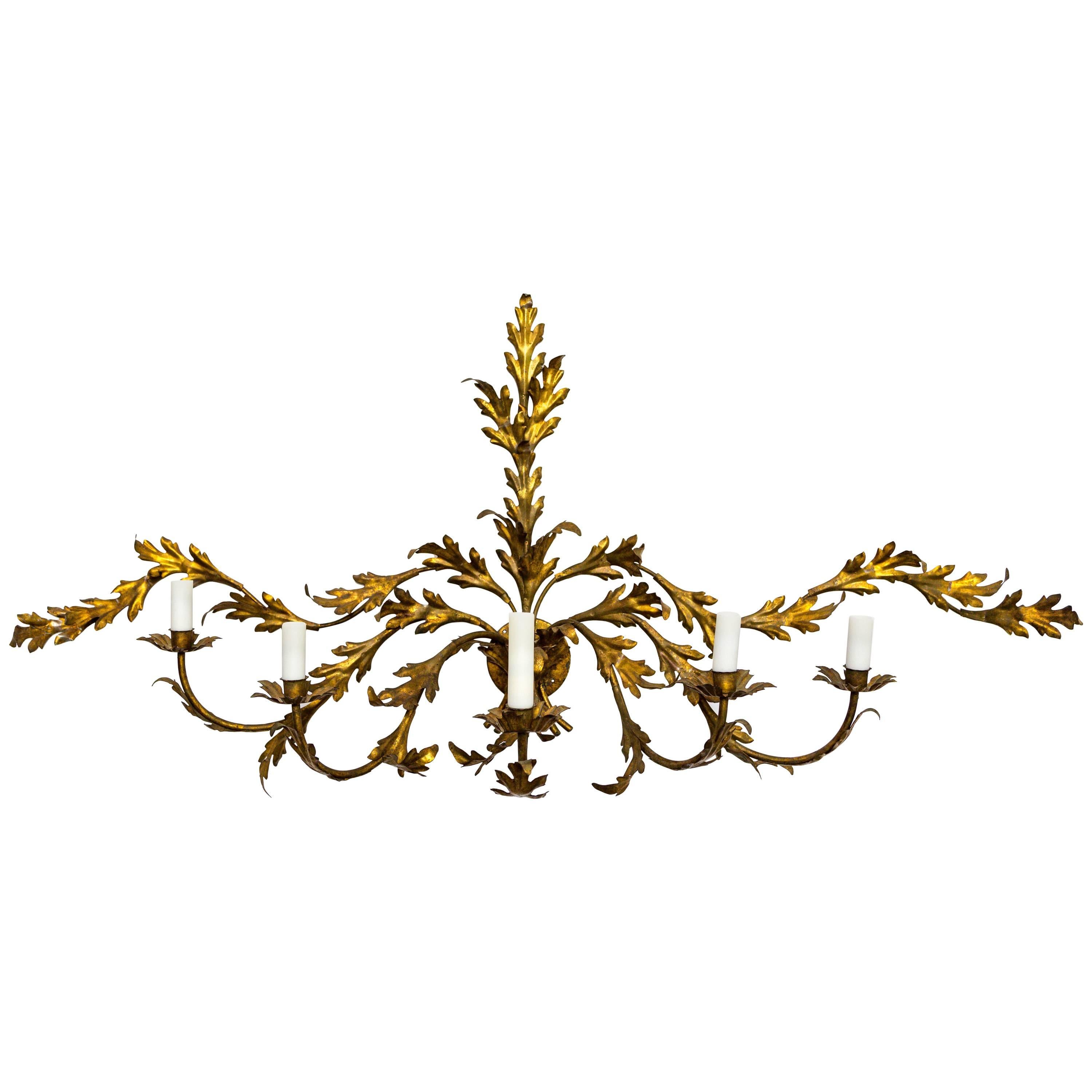 Expansive Gilded Leaves Sconce For Sale