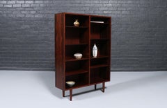 Libreria moderna danese in legno di palissandro sapientemente restaurata da Carlo Jensen per Hundevad