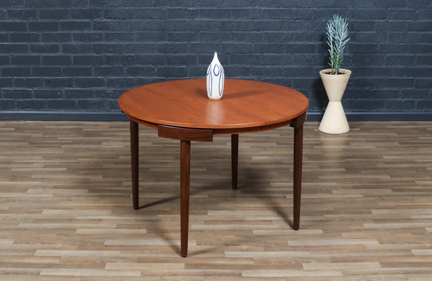 Mid-Century Modern Expertly Restored-Danish Modern “Roundette” Expanding Dining Table by Hans Olsen For Sale