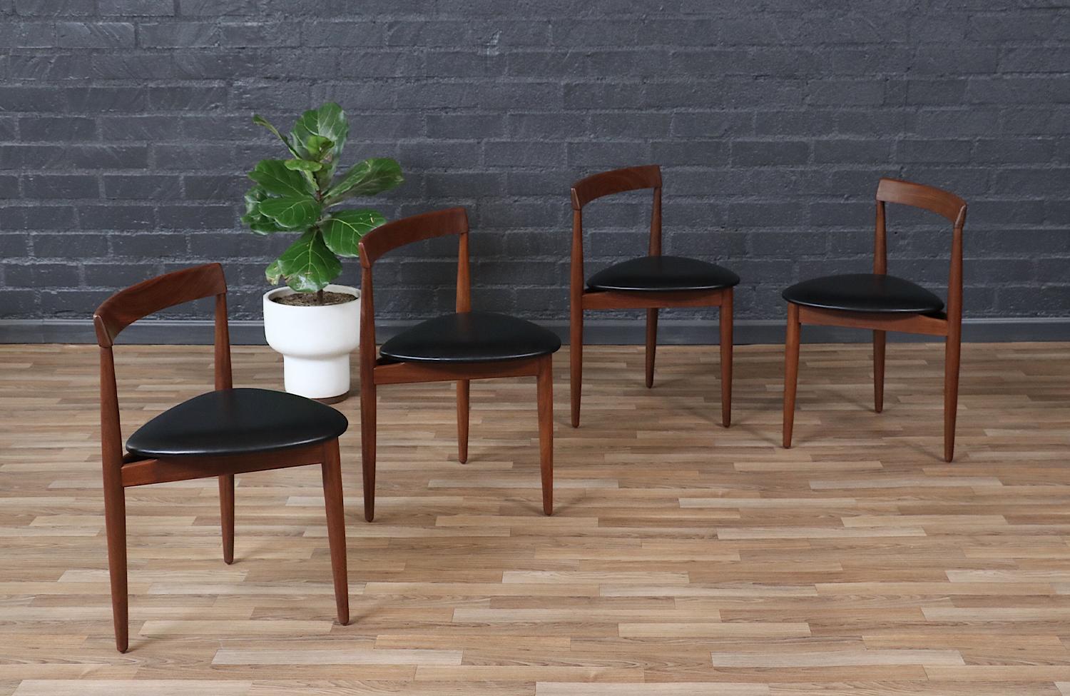 Mid-20th Century Expertly Restored - Danish “Roundette” Butterfly-Leaf Dining Set by Hans Olsen