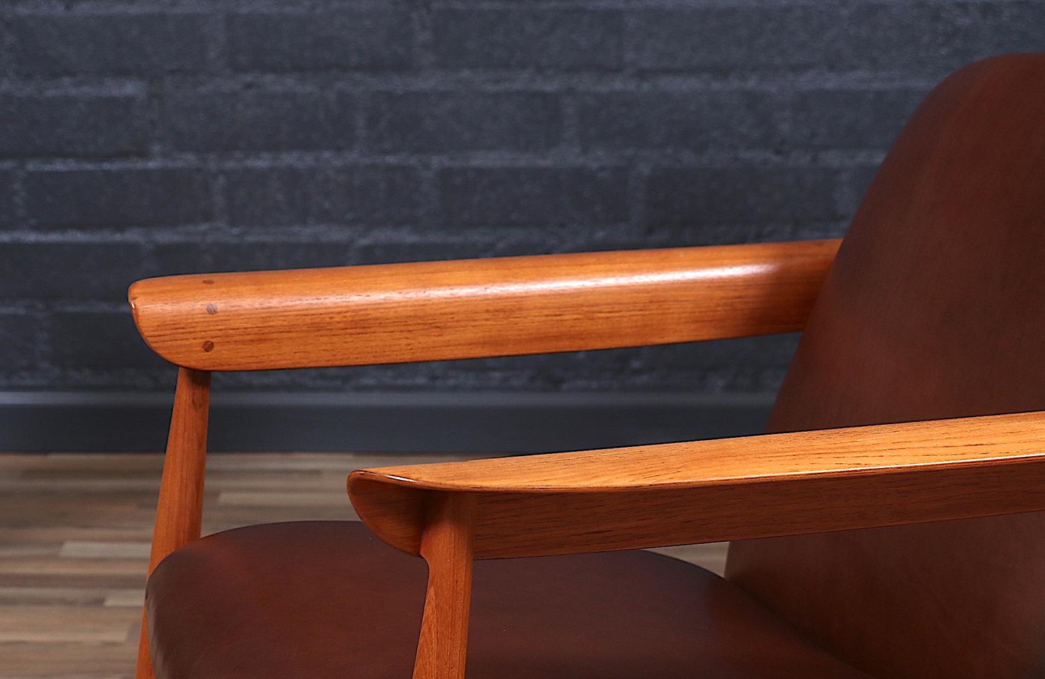Expertisch restauriert - Finn Juhl Modell BO-118 Cognacfarbener Loungesessel aus Leder und Teakholz im Angebot 4