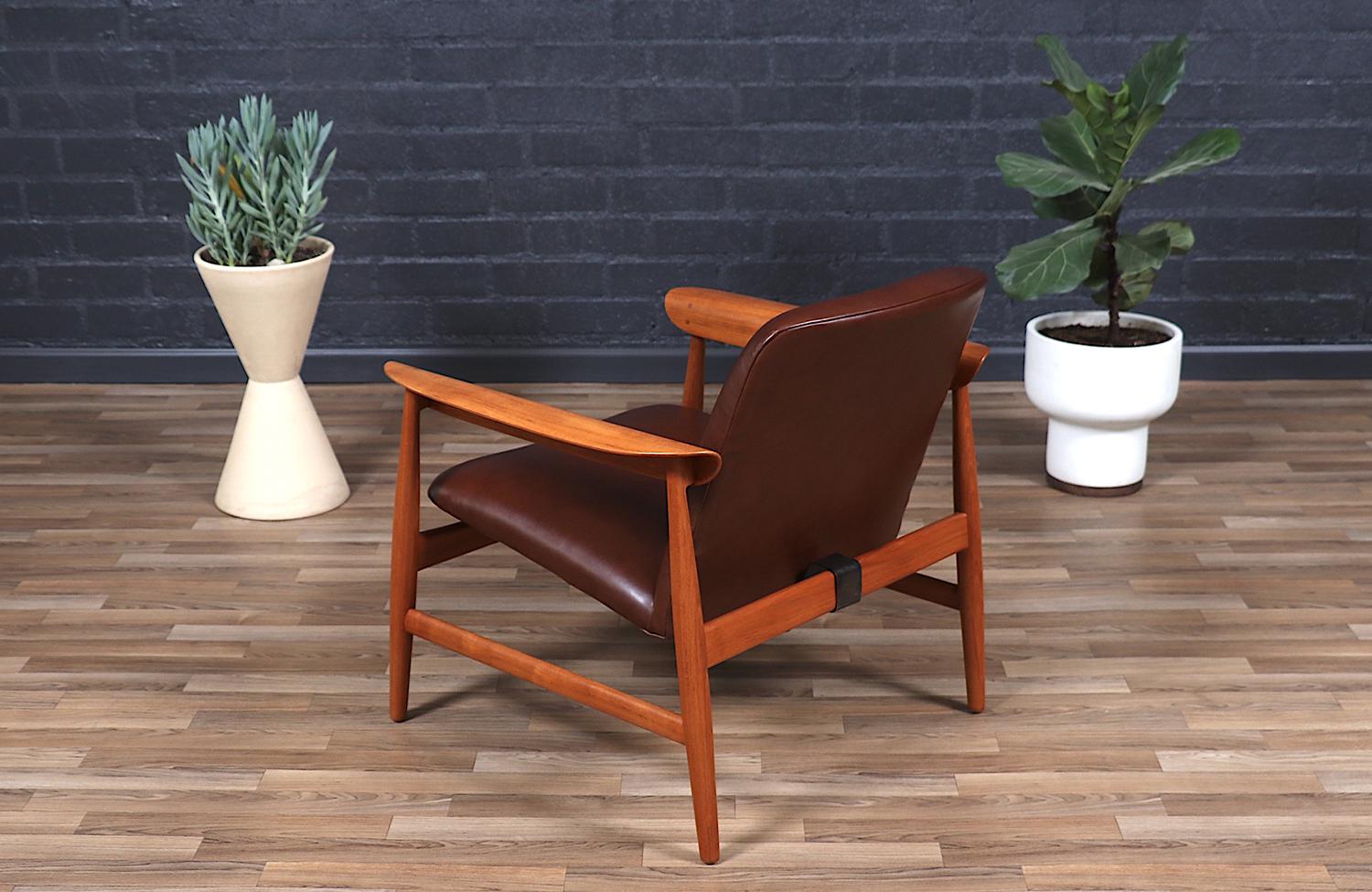 Expertisch restauriert - Finn Juhl Modell BO-118 Cognacfarbener Loungesessel aus Leder und Teakholz im Zustand „Hervorragend“ im Angebot in Los Angeles, CA