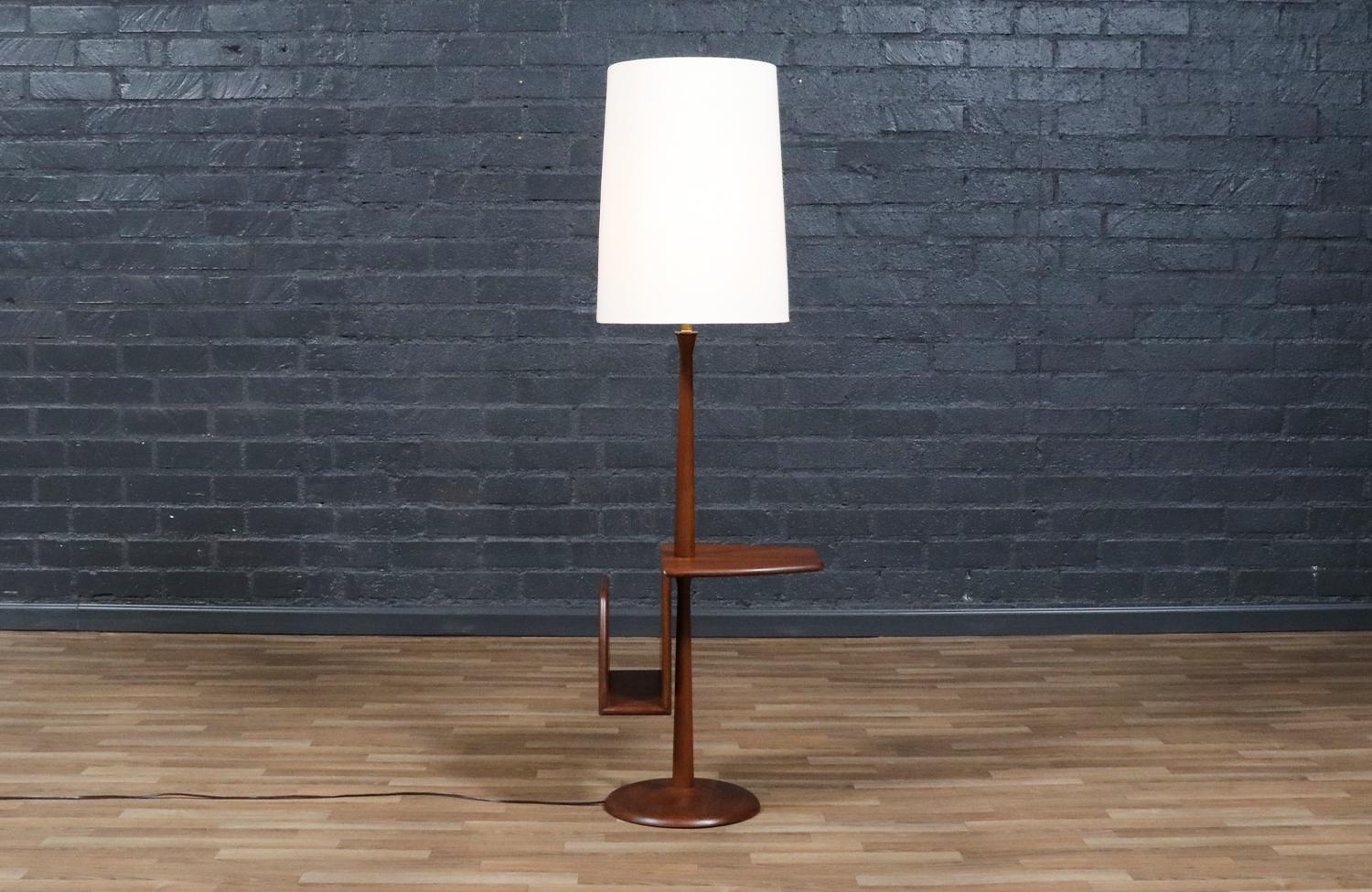 Dimensions
53in H x 14in W x 17.75in D
Lamp Shade: 20.25in H x 15in W x 15in D

________________________________________

Transforming a piece of Mid-Century Modern furniture is like bringing history back to life, and we take this journey with