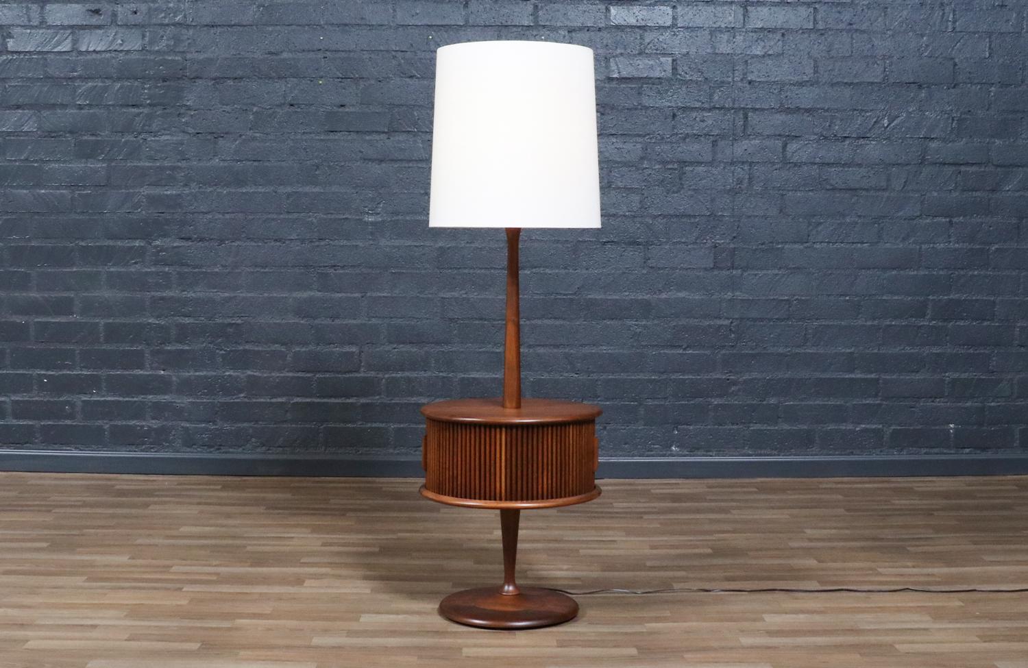 Dimensions
55.25in H x 17.75in W x 17.75in D
Table Height: 20.50in
Shade:
17in H x 16.50in W x 16.50in D
________________________________________

Transforming a piece of Mid-Century Modern furniture is like bringing history back to life, and we