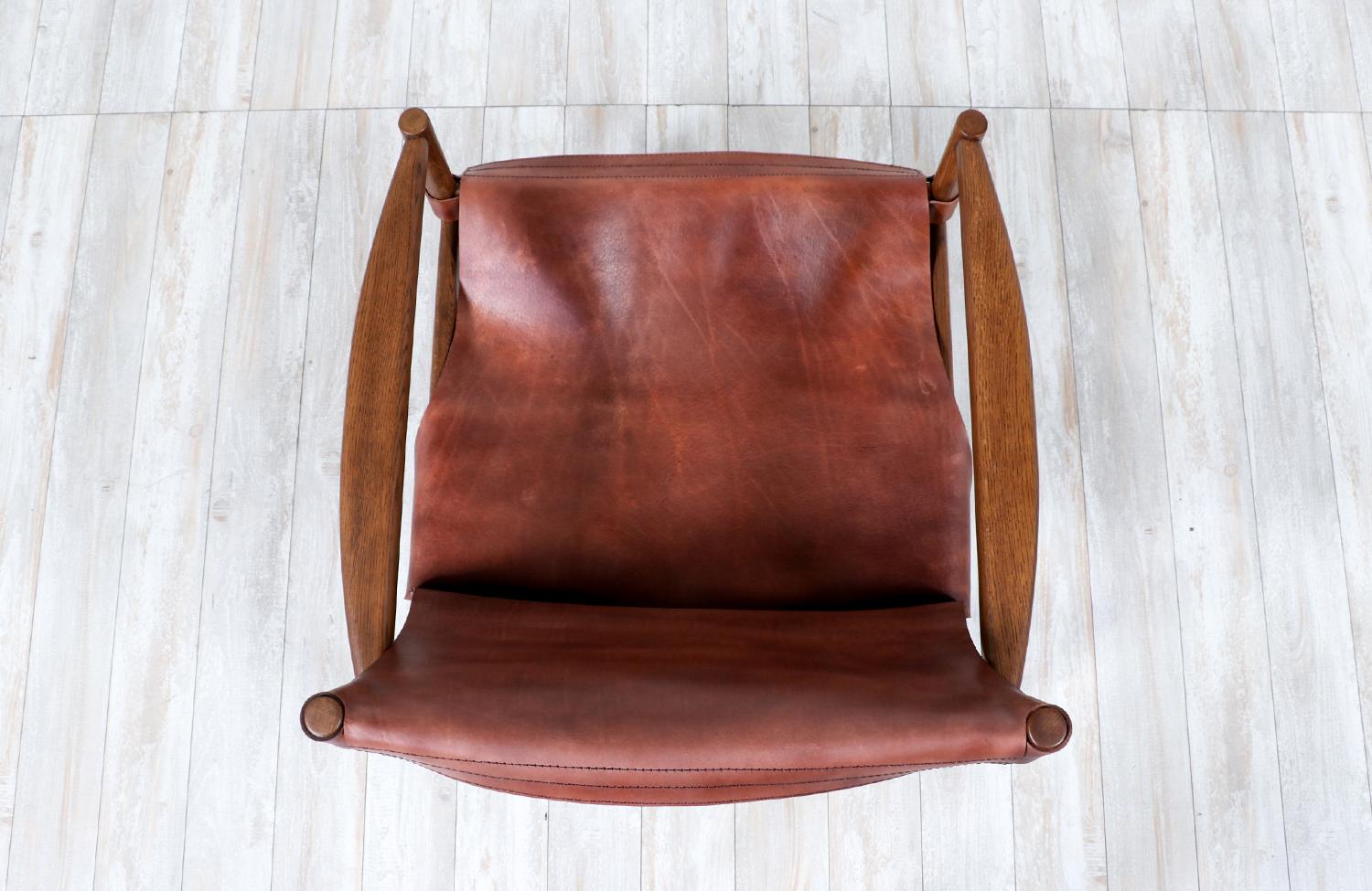 Fachmännisch restauriert - Cognacfarbener Safari-Stuhl aus Leder, Mid-Century Modern im Zustand „Hervorragend“ im Angebot in Los Angeles, CA