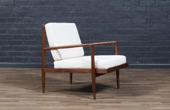 Fachmännisch restauriert - Mid-Century Modern Geformter Nussbaum Sessel mit Messing