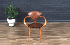 Restaurata con perizia - Sedia a bracci Norman Cherner "Pretzel" per Plycraft