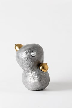 Exploited woman, contemporary sculpure in cast aluminum, removable parts