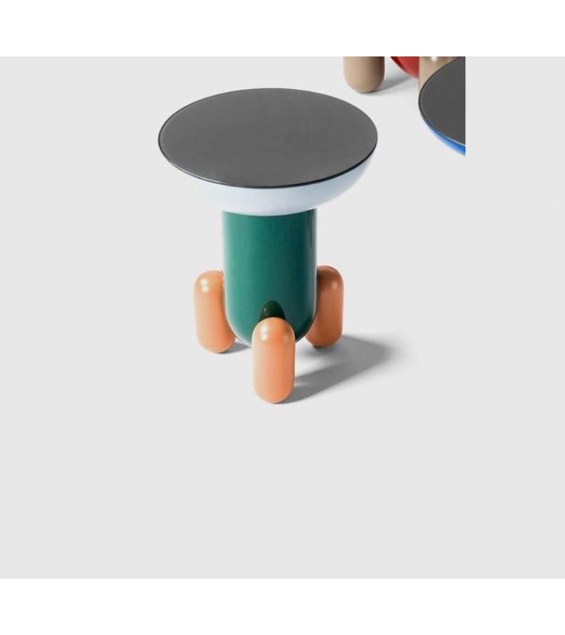 Explorer 1 side table by Jaime Hayon
Dimensions: Diameter 40 x Height 50 cm 
Materials: Lacquered fiberglass body. Solid turned wooden legs and lacquered. Painted glass tabletop.
Available in sizes Explorer 2 (Diameter 60 cm) and Explorer 3