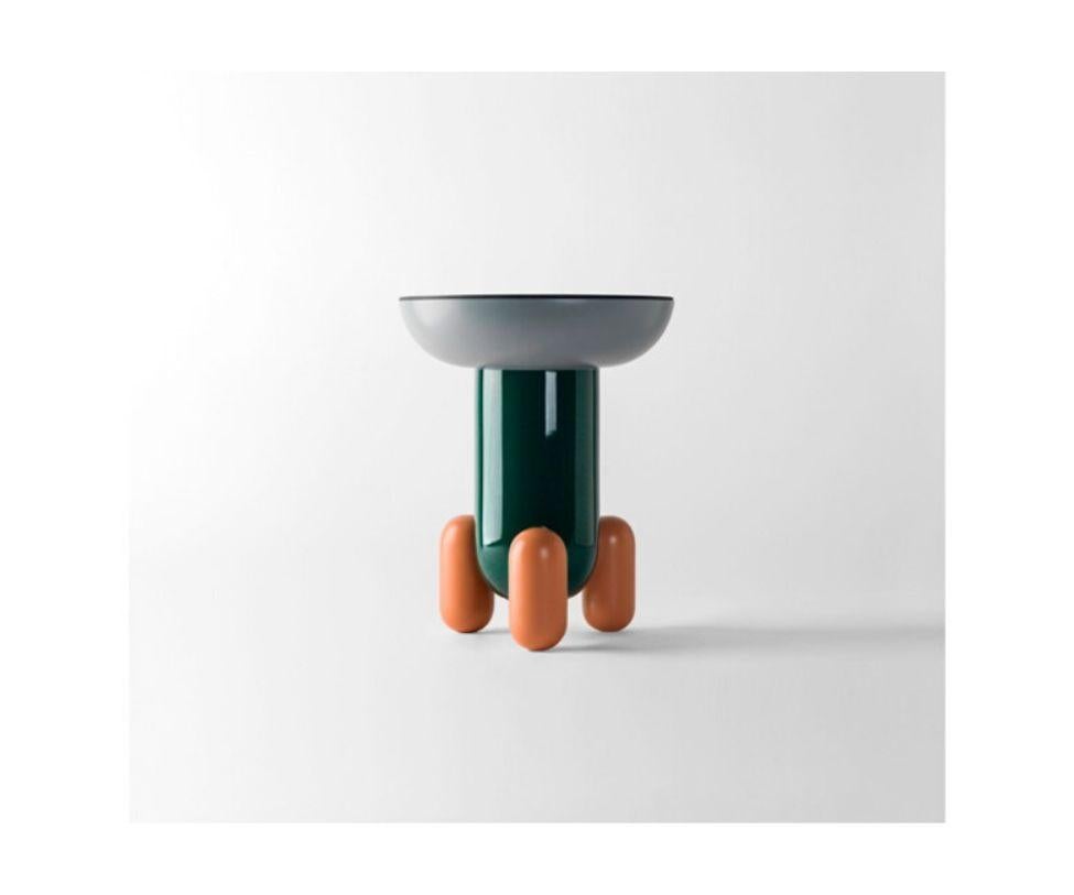 Designed by Jaime Hayon
A series of side tables, Explorer 1, 2 and 3 inspired by the playful and what remind one of the jelly-beans, rounded sweets that the children eat in the US.
This childlike inspiration has at the same time a very elegant