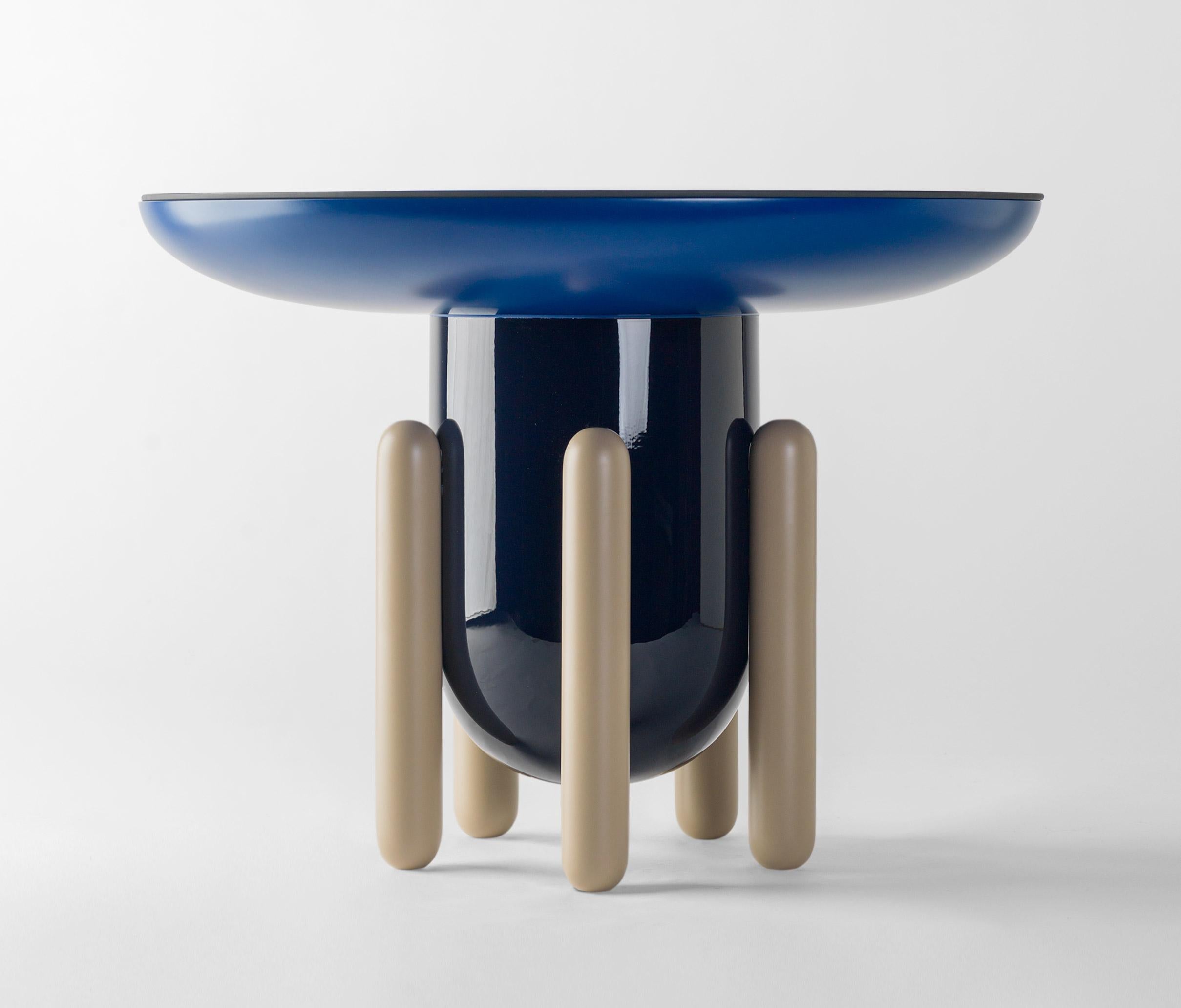 Explorer table Model 60 designed by Jaime Hayon for BD Barcelona creates an elegant beauty where it is placed. Spanish artist-designer Jaime Hayon is one of the most acclaimed creators worldwide. Hayon’s esteem and knowledge of artisan skills and