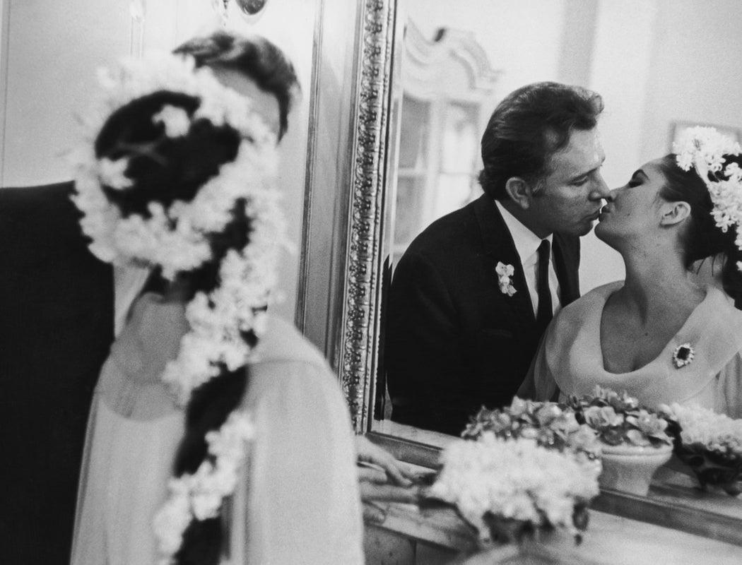 "Burton And Taylor" by Express

15th March 1964: Actress Elizabeth Taylor marries her fifth husband Richard Burton (1925-1984) in Montreal.

Unframed
Paper Size: 12" x 16'' (inches)
Printed 2022 
Silver Gelatin Fibre Print