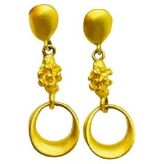 Boucles d'oreilles pendantes en or mat vintage signées EXPRESS