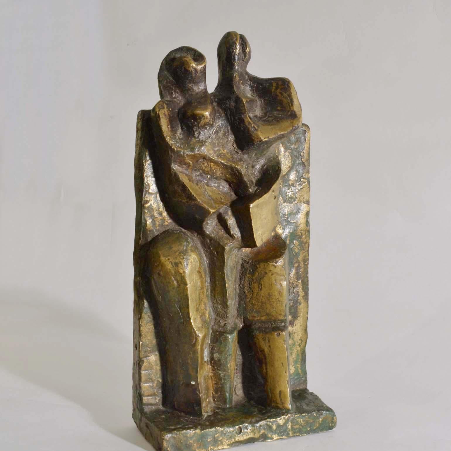 un homme et une femme sculpture