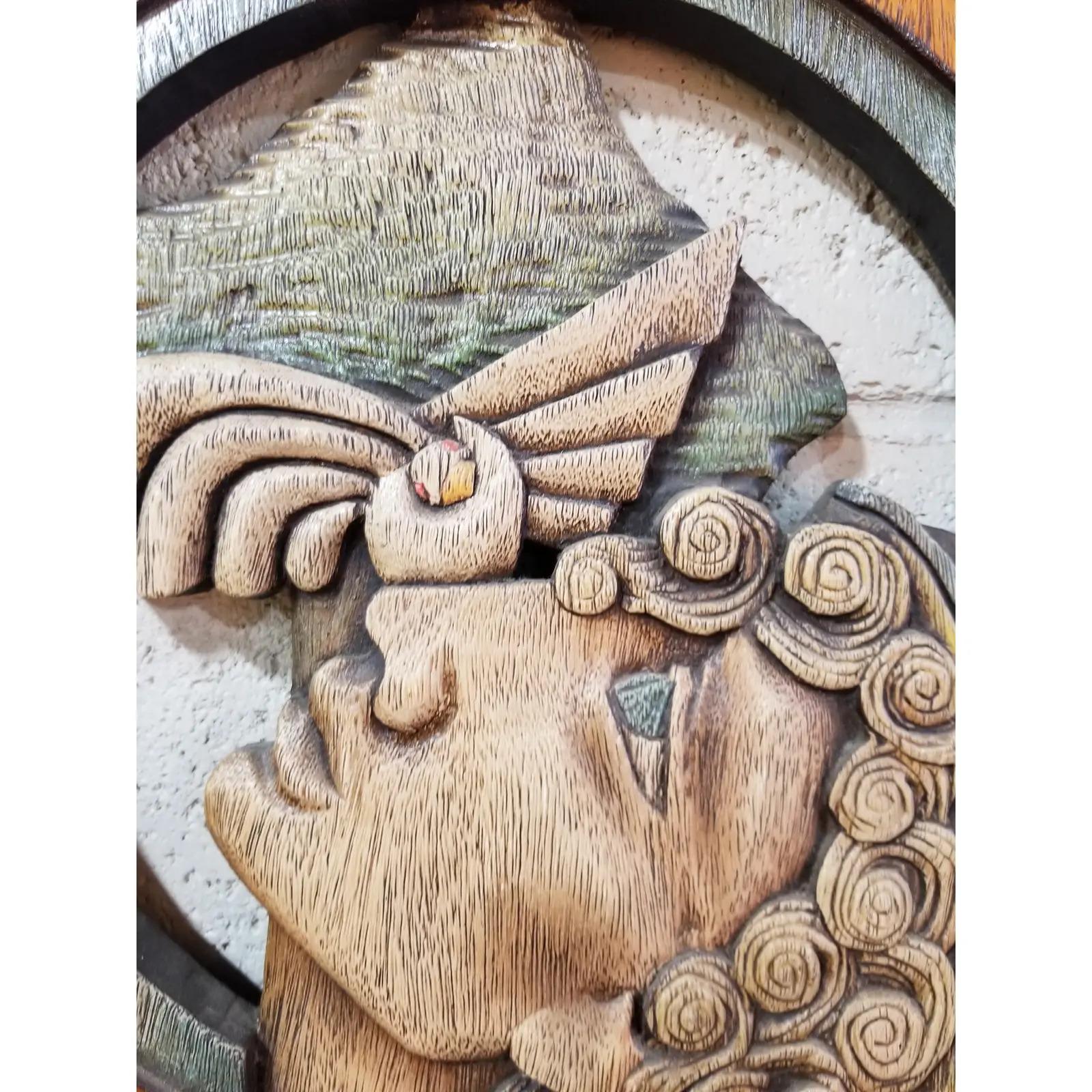 High relief, stylized figurative wall art panel in solid mahogany. Hand carved and crafted by Edison Luiz Fagundes de Castro AKA 