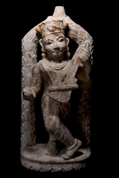 Expressive Sandstone Sculpture of Apsara Playing Sitar, 18th Century India