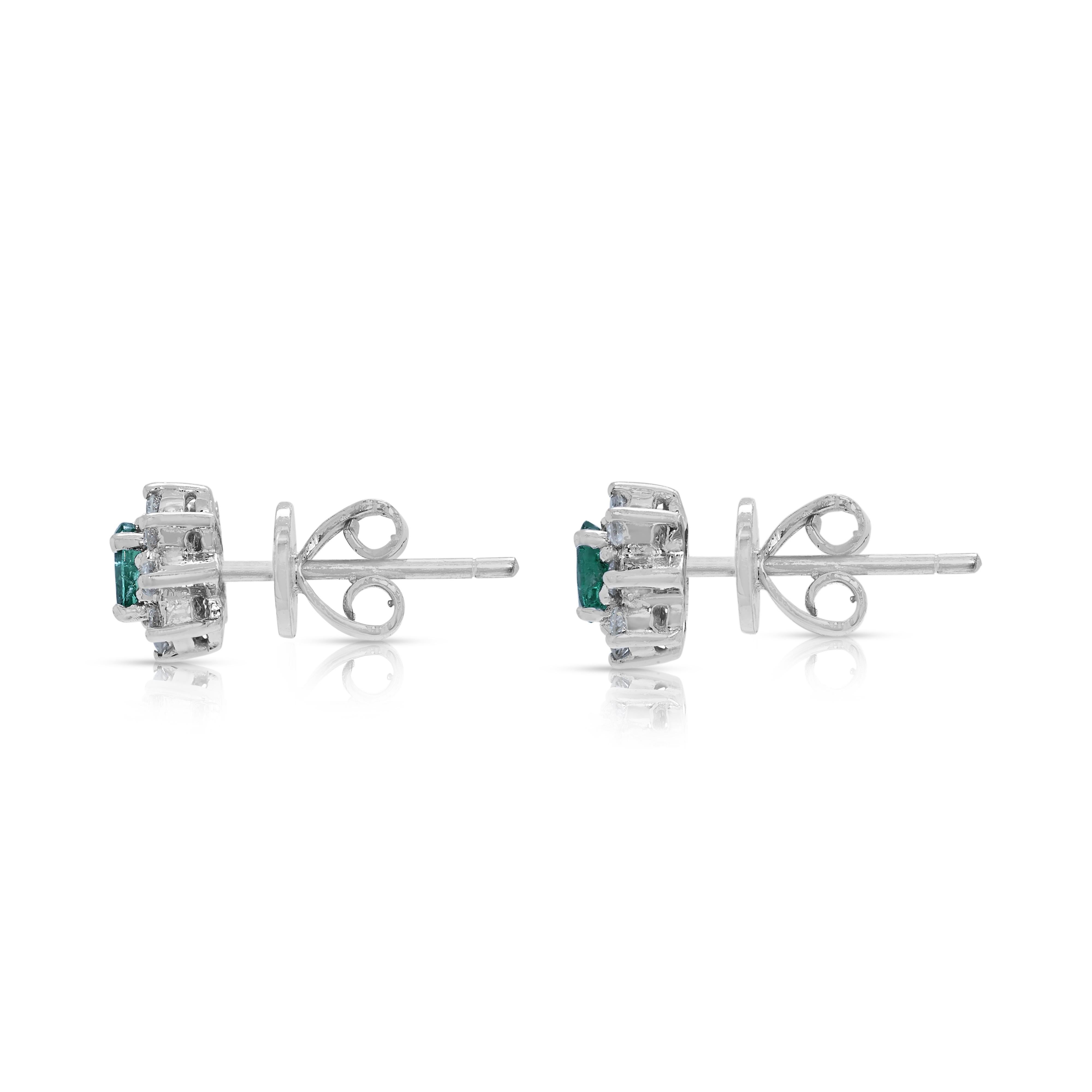 Donna Exquisite 0.30ct Emerald & Diamond Halo Stud Earrings in 18k White Gold in vendita