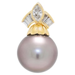 Pendentif exquis en or jaune 18 carats, diamant naturel 0,35 ct et perle des mers du Sud