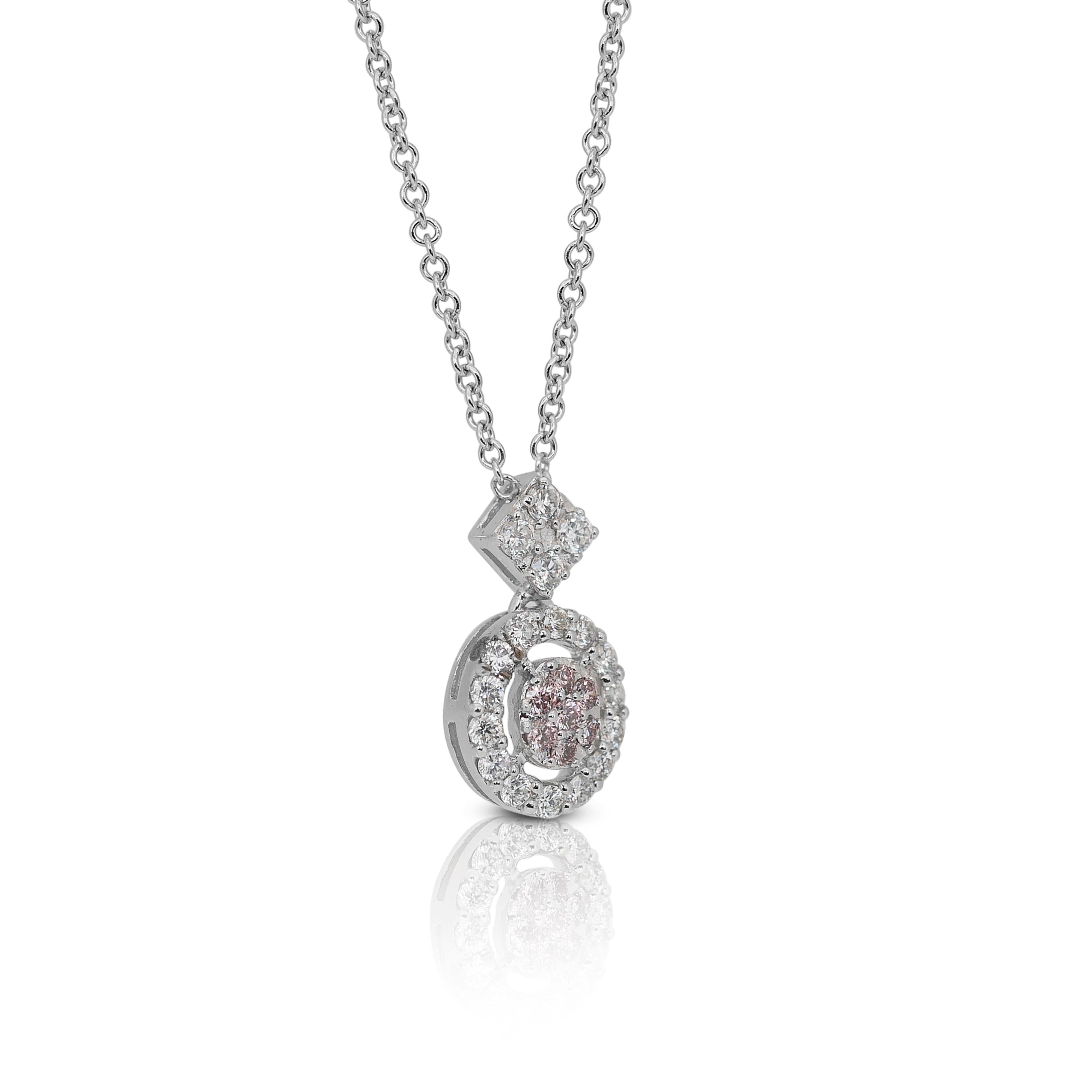 Exquisite 0.55ct Diamonds Halo Necklace with Pendant in 18k White Gold - IGI Certified

Indulge in the luxury of this stunning 18k white gold halo necklace, featuring a beautiful arrangement of diamonds. The centerpiece consists of 7 round diamonds
