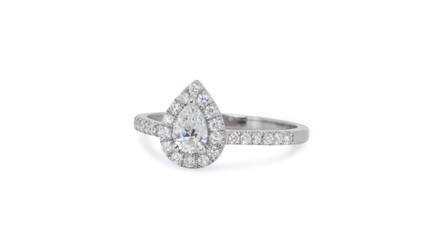 Pear Cut Exquisite 0.7 Carat Pear Diamond Ring with Dazzling Halo For Sale