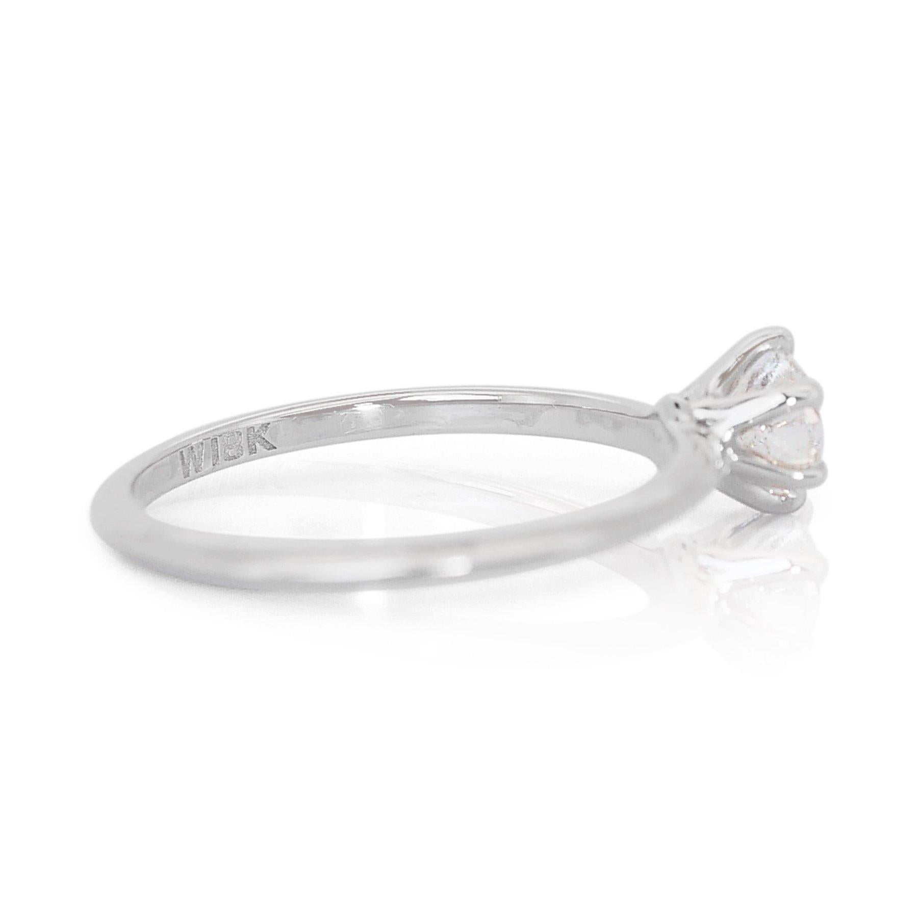 Exquisite 0.70ct Round Diamond Solitaire Ring in 18k White Gold - GIA Certified For Sale 1