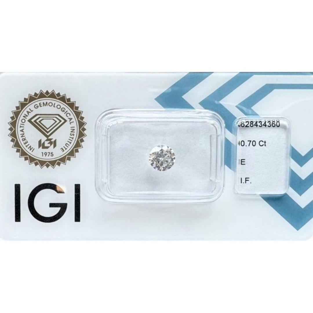 Exquisite 0.70ct Triple Excellent Ideal Cut Round Diamond - IGI Certified

Experience the epitome of diamond quality with this 0.70-carat round diamond. Boasting a triple excellent ideal cut maximizes light return and sparkle, ensuring unmatched