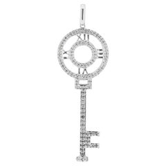 Exquisito colgante en forma de llave de oro blanco de 18 quilates con diamantes naturales de 0,9 quilates