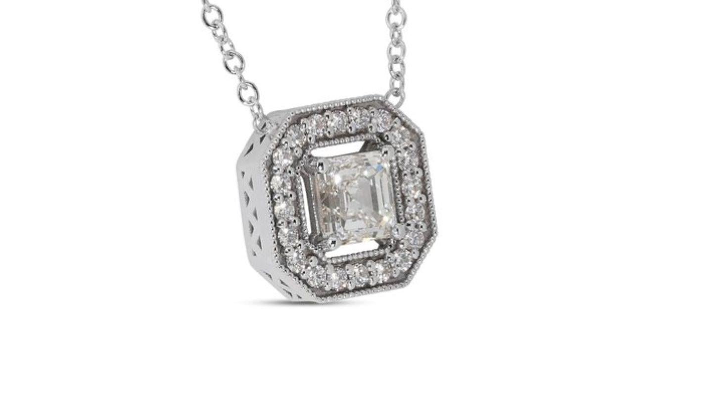 Embrace timeless elegance with this captivating necklace, showcasing a mesmerizing 1 carat asscher diamond, boasting exceptional brilliance and geometric charm. The meticulously cut center stone, renowned for its captivating square step cuts and