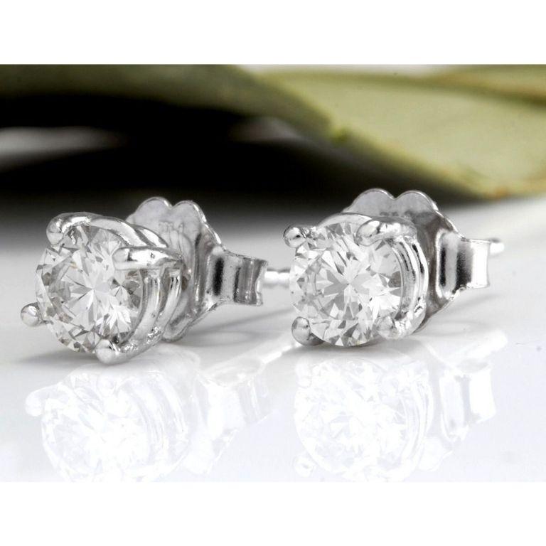 Exquisite 1.00 Carats Natural Diamond 14K Solid White Gold Stud Earrings

Amazing looking piece!

Total Natural Round Cut Diamonds Weight: 1.00 Carats (both earrings) VS2-S1 / H

Diamond Measures: Approx. 5.2mm

Total Earrings Weight is: 1.2