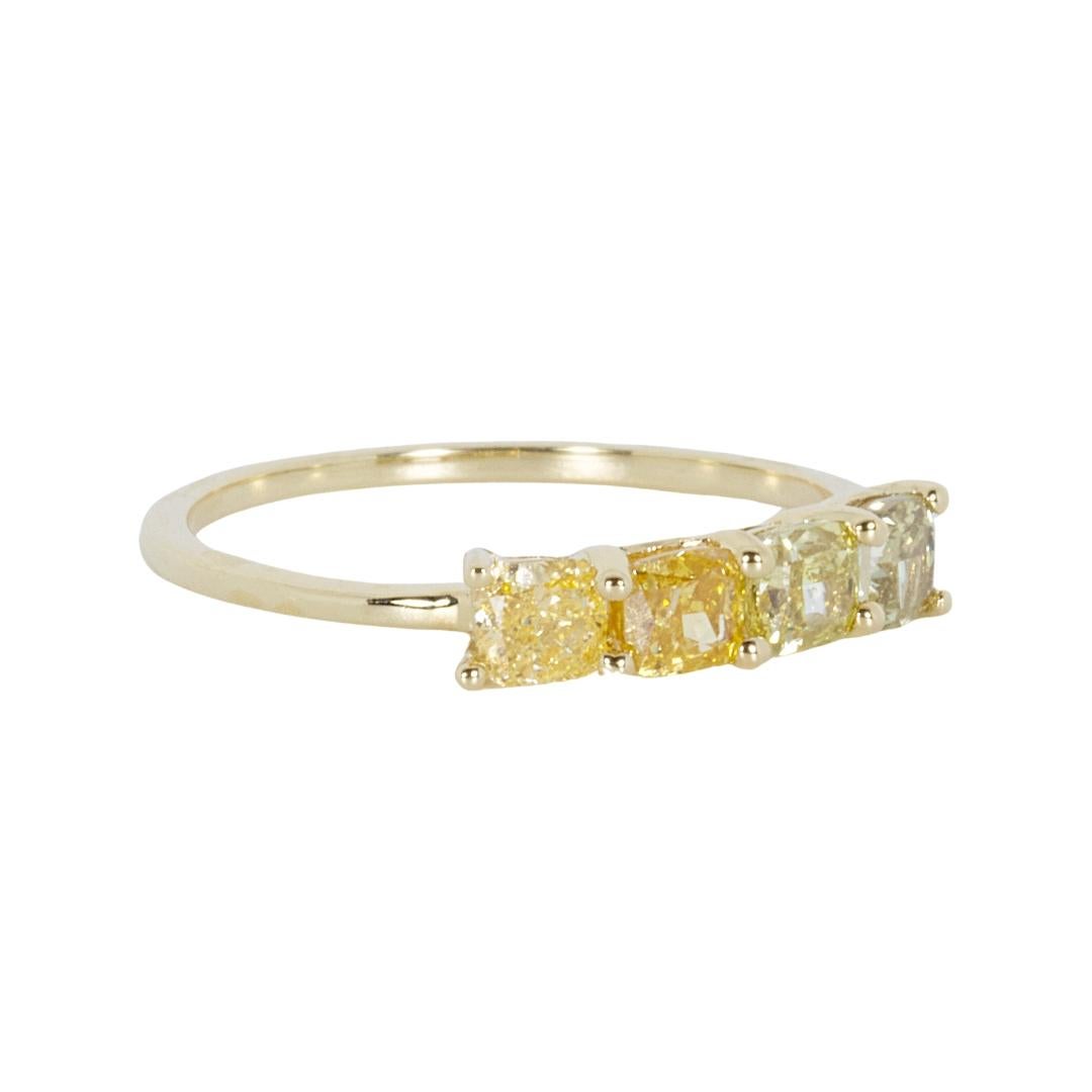 Exquisite 1.00 ct Fancy Colored Diamond Ring in 18k Yellow Gold - IGI Certified

This fancy-colored diamond ring is a symphony of hues, featuring 4 square cushion-cut diamonds with a total weight of 1.00-carat. The good cut grade of these gems