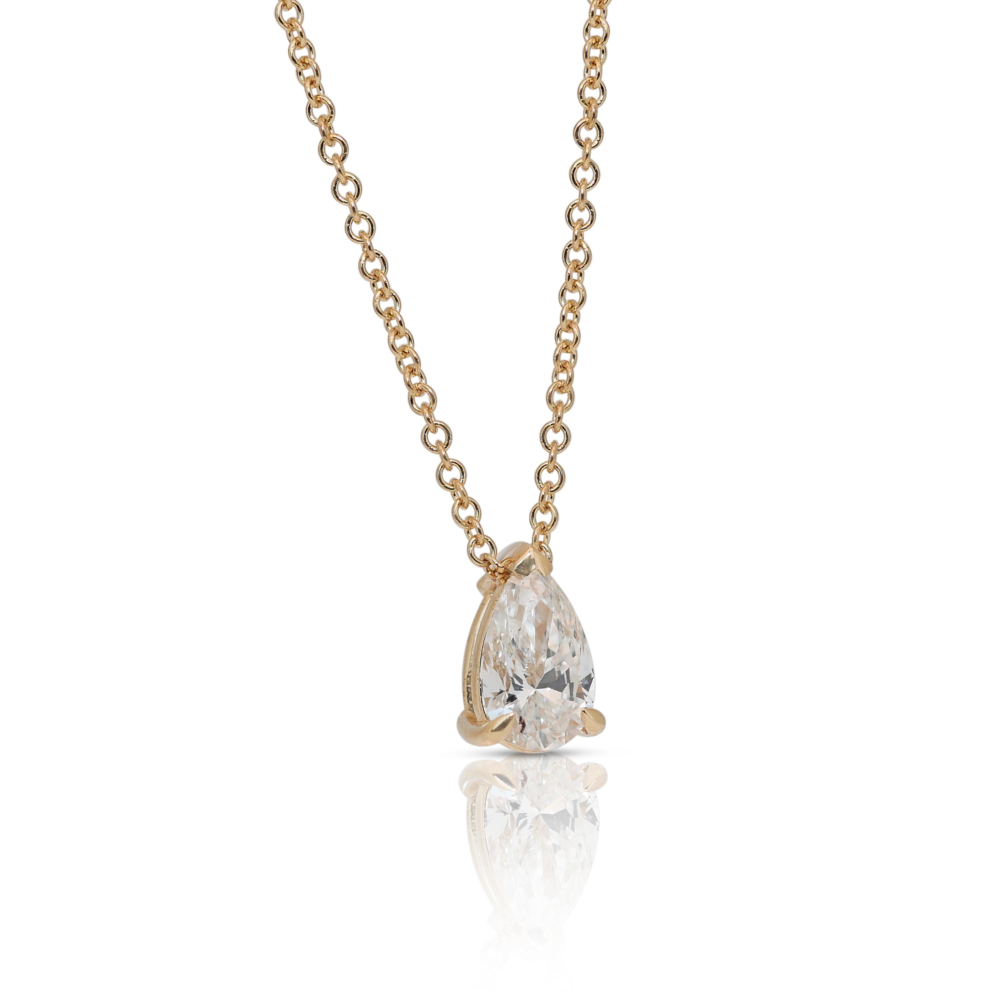 Exquisite 1.00ct Double Excellent Ideal Cut Diamond Solitaire Necklace with Pendant in 18k Yellow Gold - GIA Certified

This exquisite 18k yellow gold necklace features a stunning 1.00-carat pear-cut diamond as its centerpiece. With a double