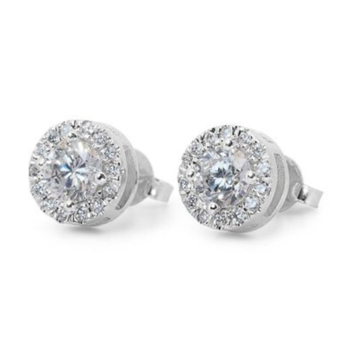 Round Cut Exquisite 1.14 Carat D Color VVS1 Diamond Halo Earrings in 18K White Gold For Sale