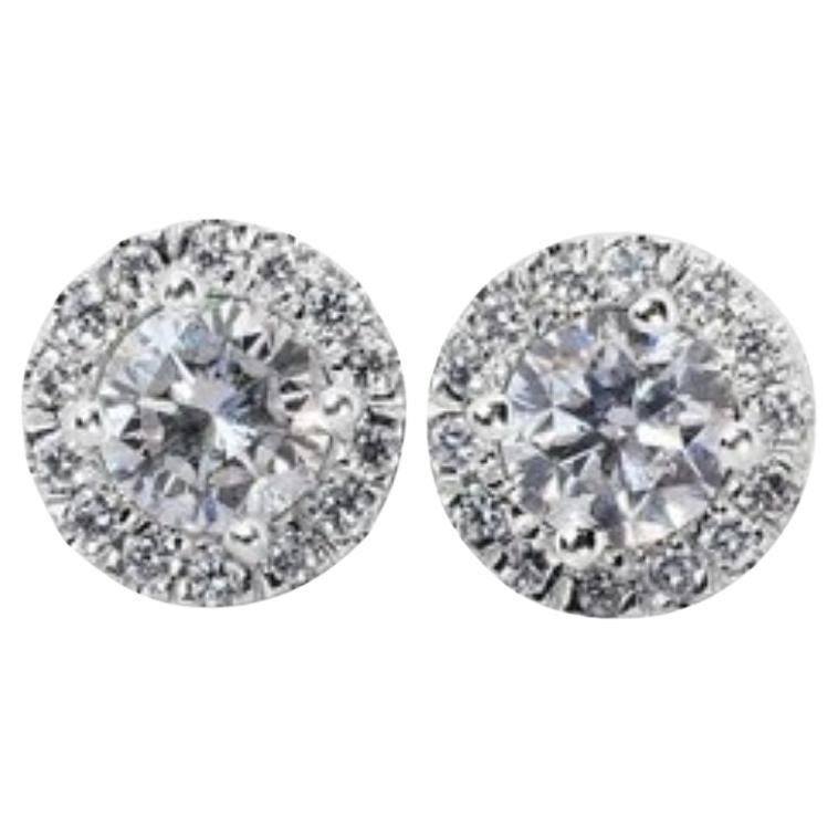 Exquisite 1.14 Carat D Color VVS1 Diamond Halo Earrings in 18K White Gold For Sale