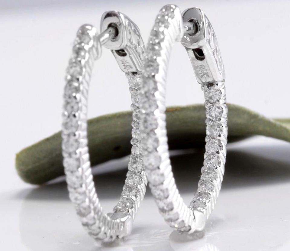 Exquisite 1.15 Carats Natural Diamond 14K Solid White Gold Hoop Earrings

Amazing looking piece!

Inside Out Diamonds.

Earrings have safety lock.

Total Natural Round Cut White Diamonds Weight: 1.15 Carats (color G-H / Clarity SI1-SI2)

Earring