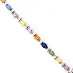 Exquisite 11.72 Carat Multi-Color Oval Sapphire Bracelet Set in 14k White Gold
