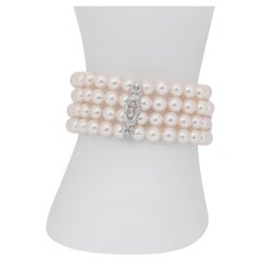 Magnifique bracelet en or blanc 18 carats, perles d'eau salée et diamants 120,61 carats
