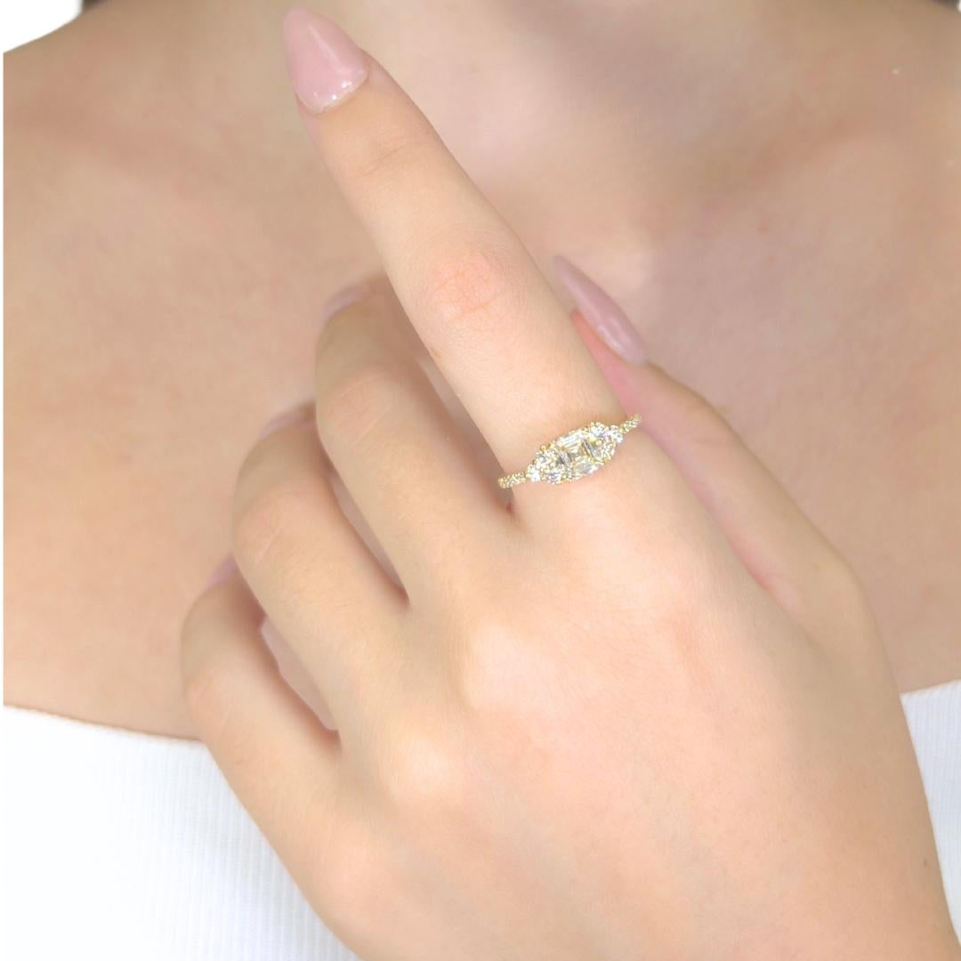Exquisite 1.36ct Diamonds Ring in 18k Yellow Gold - IGI Certified

A striking blend of elegance and brilliance, this 18K yellow gold ring highlights a 1.01ct square-cut diamond radiating brilliance with refined precision. Surrounding the