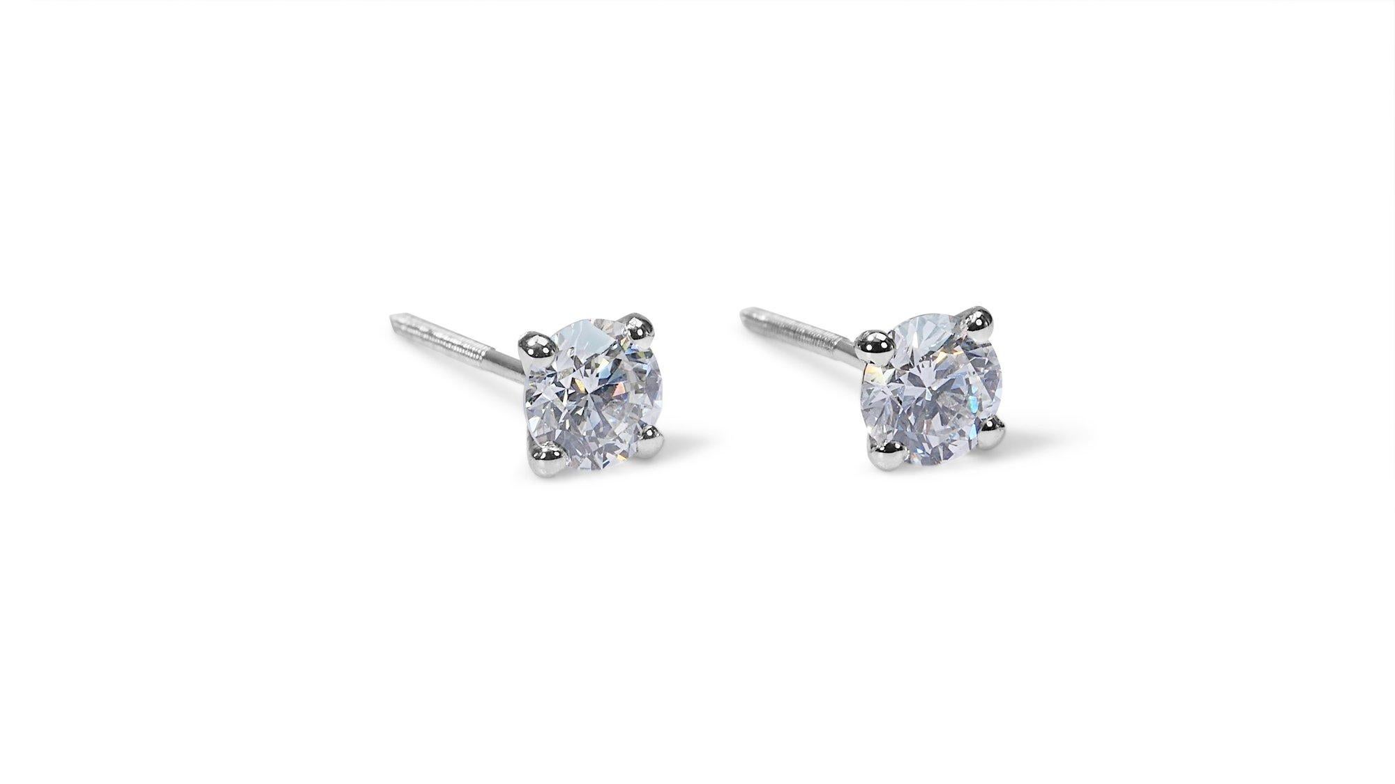 Round Cut Exquisite 1.42ct Round Diamond Stud Earrings in 18k White Gold - GIA Certified For Sale