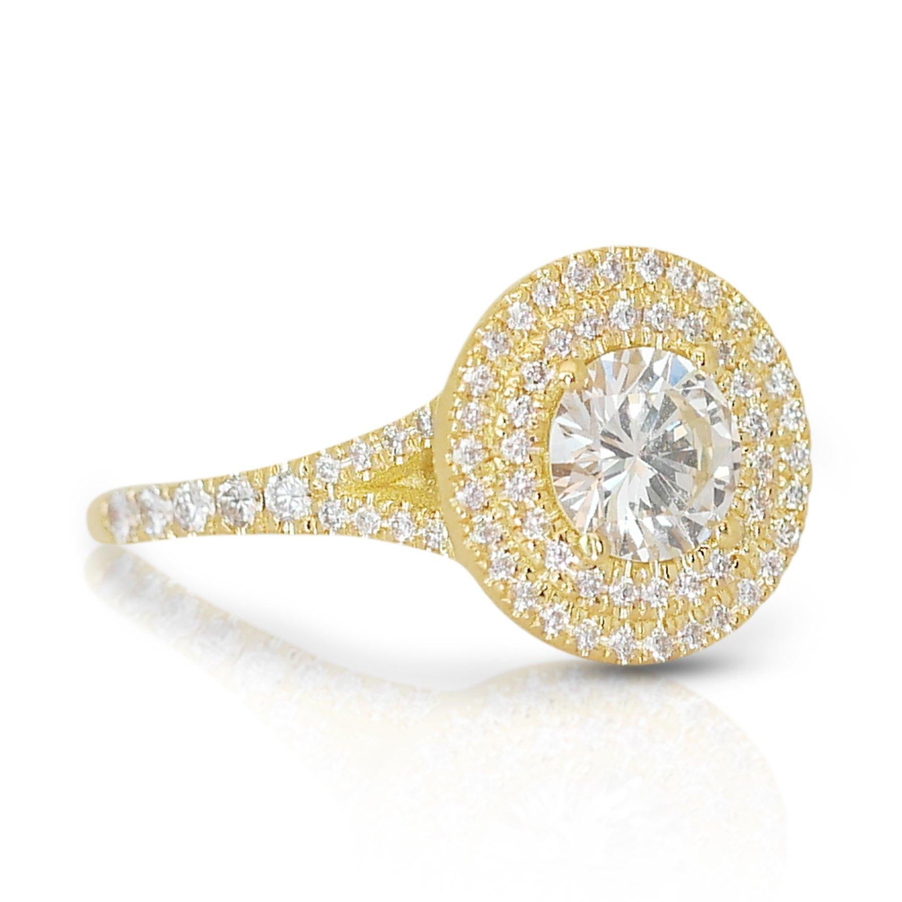 Exquisite 1.44ct Diamond Double Halo Ring in 18k Yellow Gold - GIA Certified

This stunning diamond double halo ring, meticulously crafted from 18k yellow gold, features a mesmerizing 1.03-carat round brilliant main diamond. Surrounding the central