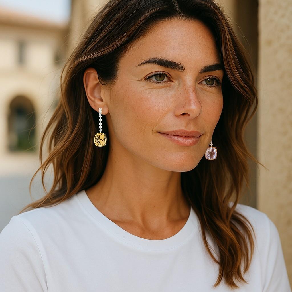 A Stunning Fusion of Color and Elegance
Elevate your jewelry collection with these magnificent 14K Yellow and White Gold drop earrings, featuring large cushion-cut Morganite and Yellow Beryl gemstones, meticulously matched in shape and size. This