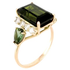 Exquisite 14K Gold Ring with 4.75 ct Green Tourmaline and 0.33 ct Diamonds