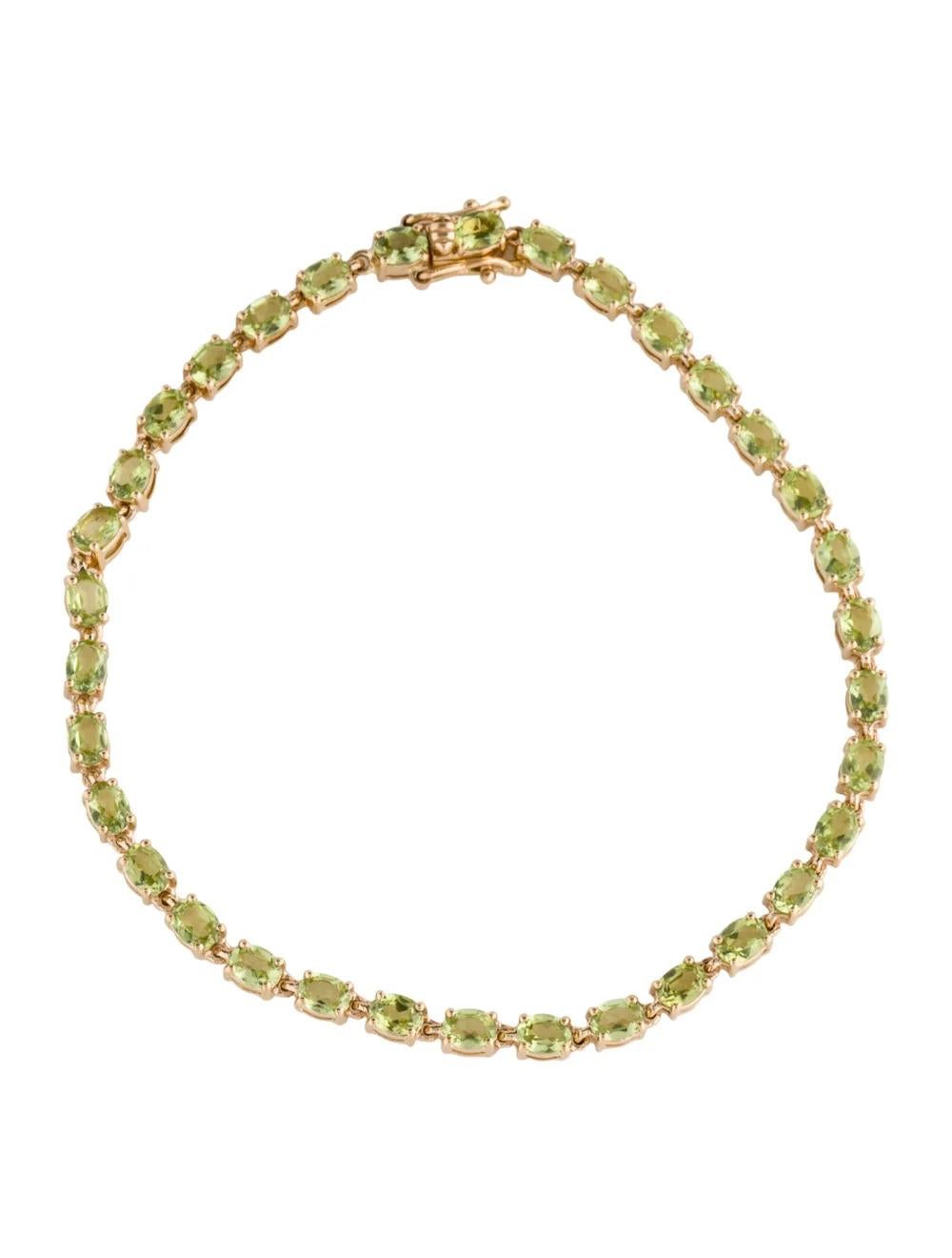 Elevate your jewelry collection with this stunning 14K Yellow Gold Peridot Link Bracelet, a dazzling statement piece that exudes timeless elegance and sophistication.

Specifications:

* Metal Type: 14K Yellow Gold
* Gemstone: Peridot
* Carat