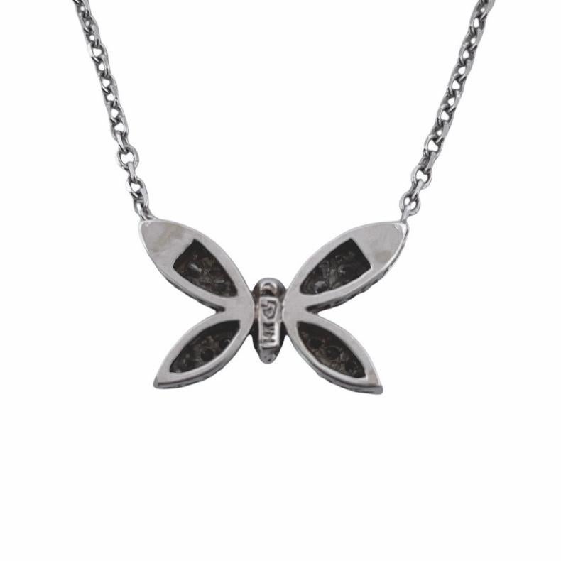 This exquisite 14K White Gold with 0.18 carat Natural White Diamonds Butterfly Necklace is a symbol of elegance and grace. Adorned with shimmering diamonds, this necklace captures the beauty of nature with a touch of sophistication. Elevate your