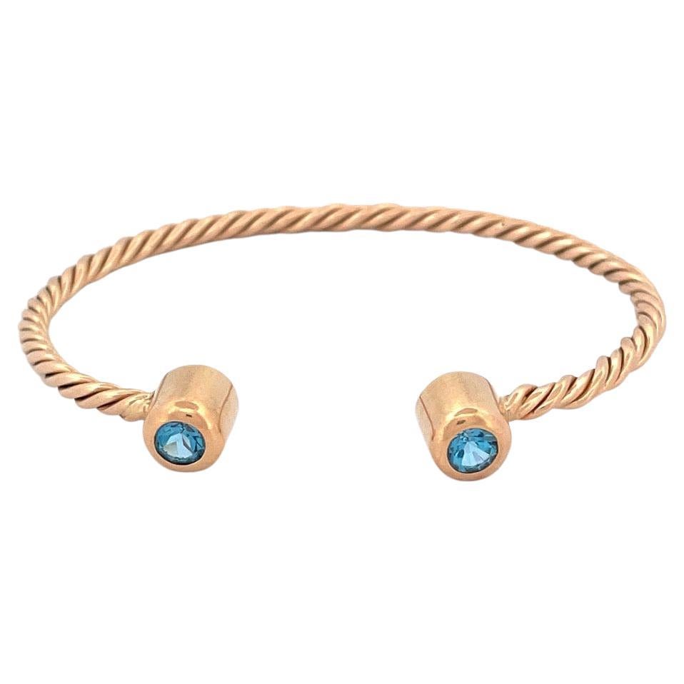 Exquisite 14k Yellow Gold Blue Topaz Rope Bangle For Sale at 1stDibs