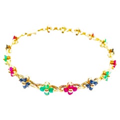 Magnifique bracelet à fleurs multicolore en or jaune 14 carats