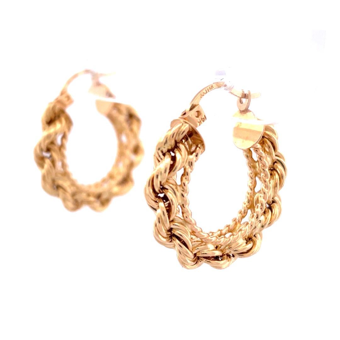 Exquisite 14k Yellow Gold Rope Hoop Earrings

Elevate your style with these enchanting 14k yellow gold rope hoop earrings. The earrings boast beautifully carved details, adding a touch of intricate charm to your look. Weighing only 2.8 grams, they