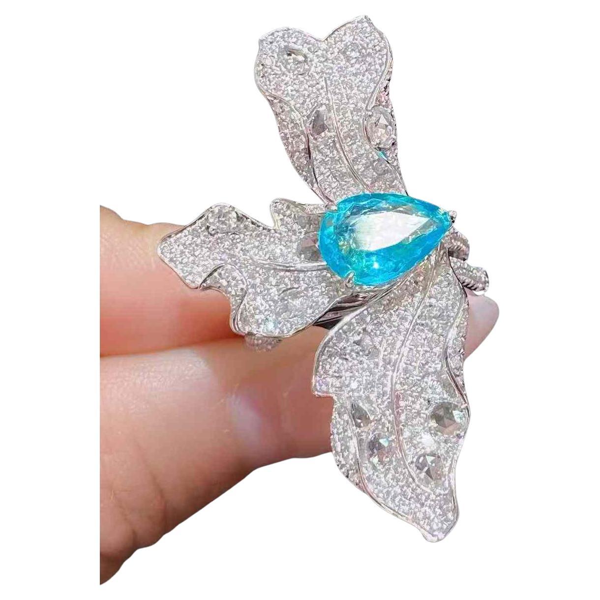 Exquisite 1.50 Carat Teardrop Paraiba Tourmaline & Diamond 18K Gold Ring For Sale