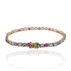Exquisite 15.25 Carat Emerald, Ruby and Sapphire 14k Yellow Gold Tennis Bracelet