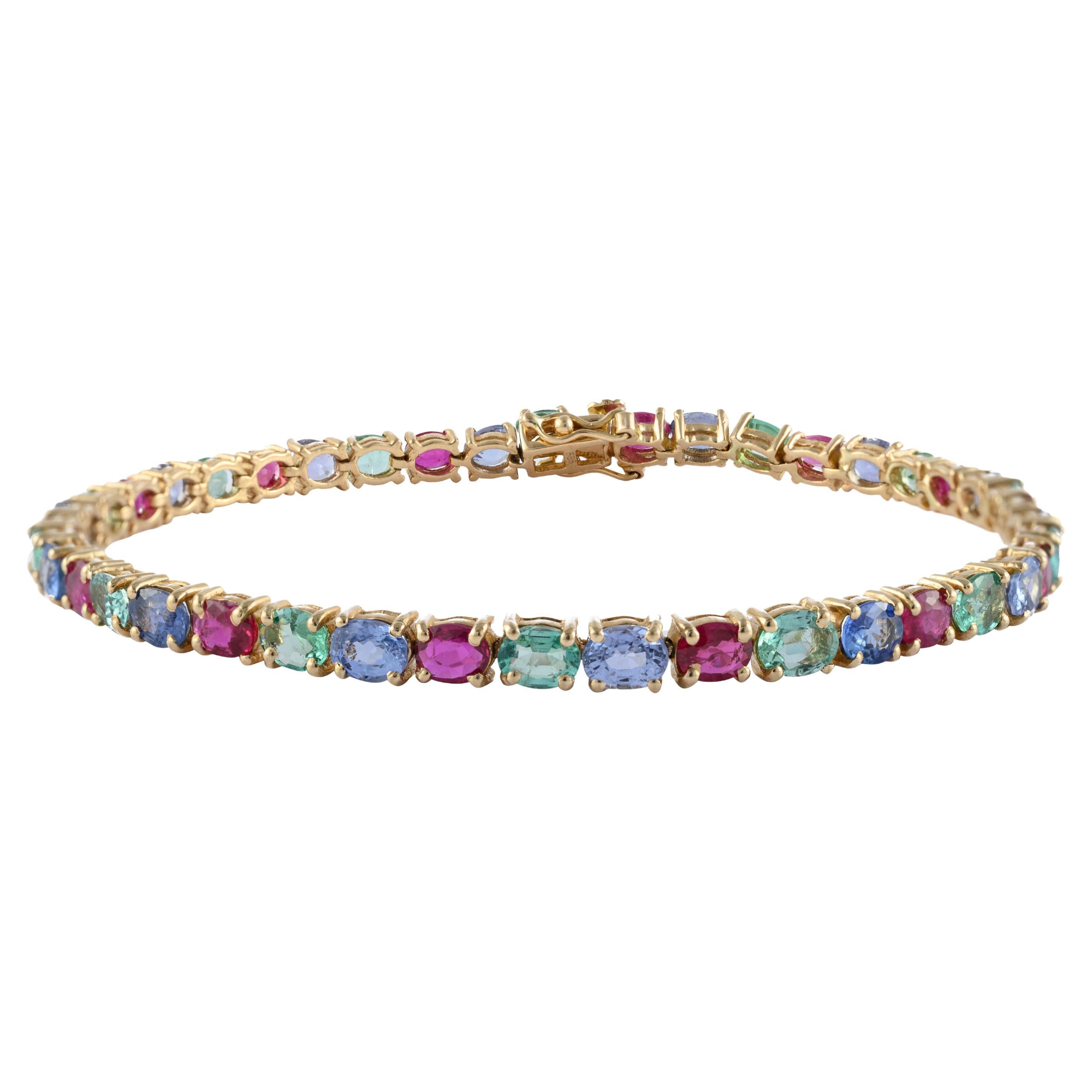 Exquisite 15.25 Carat Emerald, Ruby and Sapphire 14k Yellow Gold Tennis Bracelet For Sale