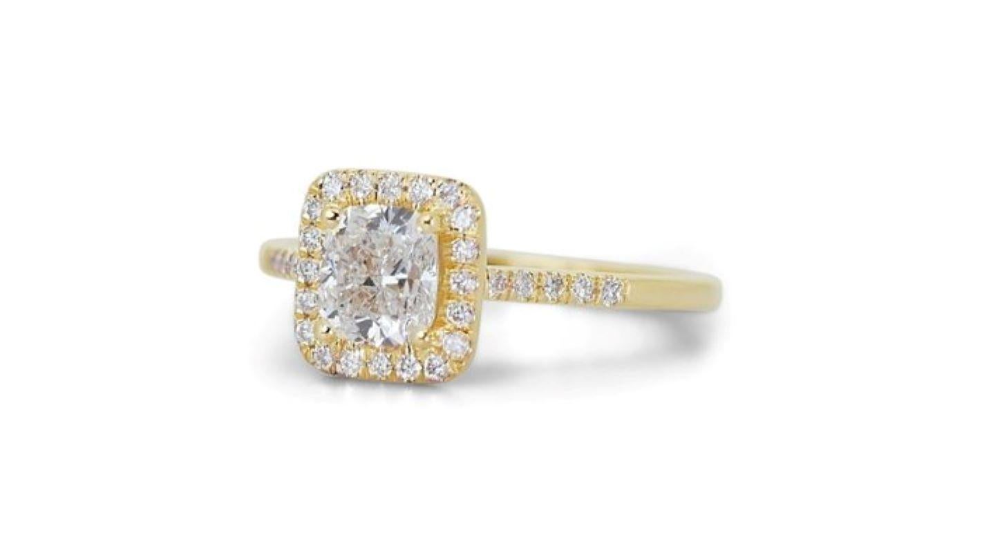 Embrace timeless elegance with this stunning ring featuring a captivating 1.54 carat cushion modified brilliant diamond, radiating brilliance and fire. The mesmerizing center stone is complemented by a sparkling halo of 30 round brilliant cut